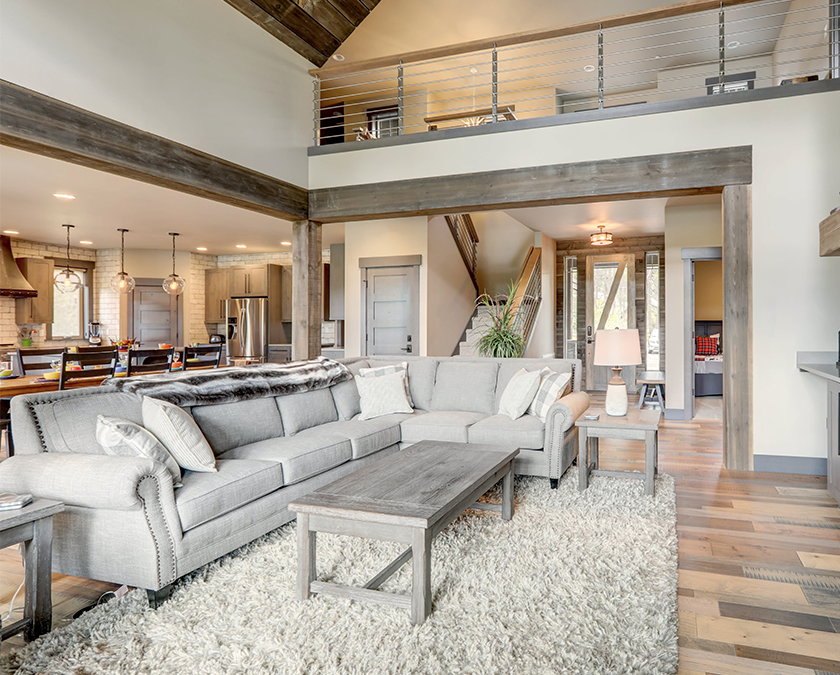 Home remodeling living room with barn beams