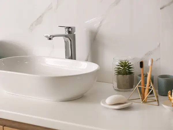 White countertop and vessel sink