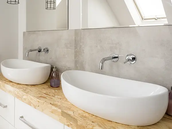 A vanity with two vessel sinks