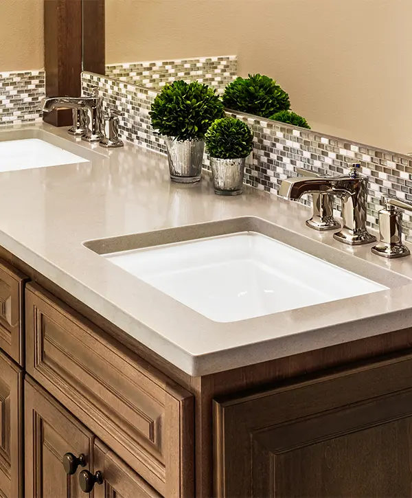 Wood vanity with beautiful undermount sink and silver faucet