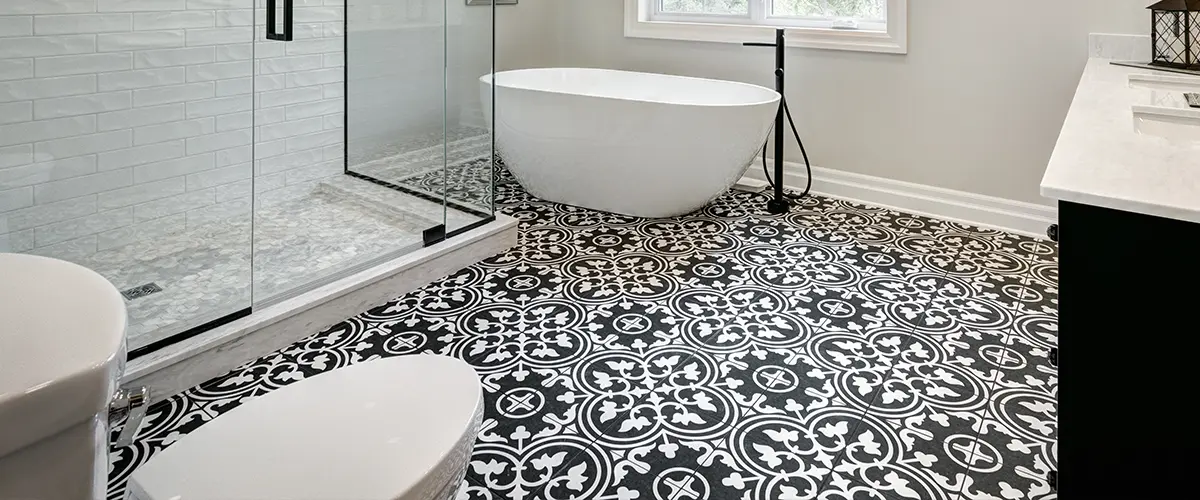 A beautiful bathroom tiled floor with an intricate design
