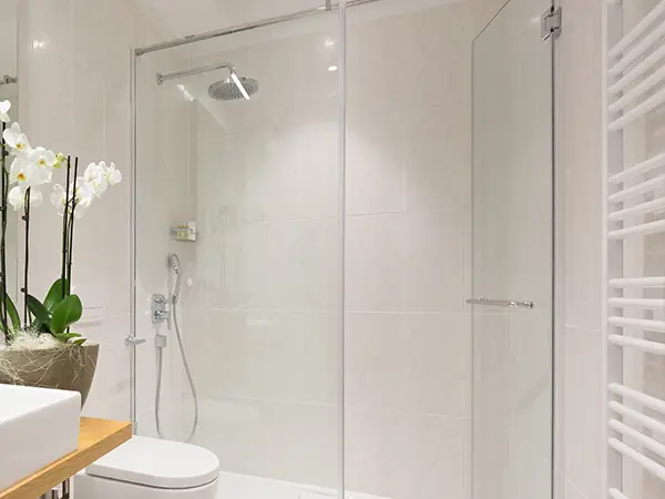 A large, glass walk-in shower