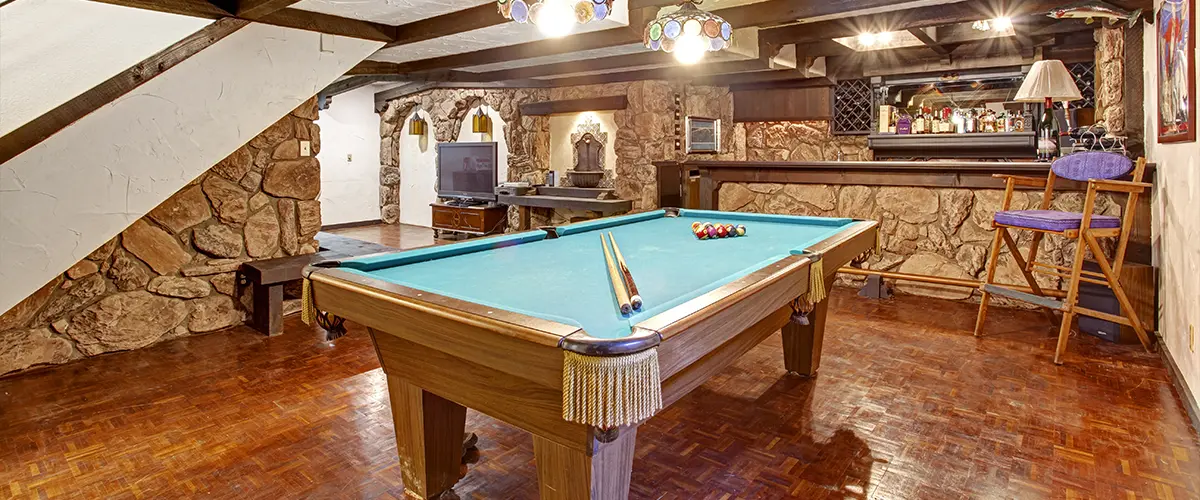 A man cave with a pool table